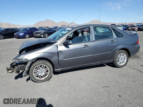2007 Ford Focus S z VIN 1FAFP34NX7W321313, wystawiony jako Copart lot #43158235 z przebiegiem 57 299 mil mil oraz Szkoda całkowita • Salvage title. Historia ofert i sprzedaży dostępna na DreamBid. Obrazek 1.