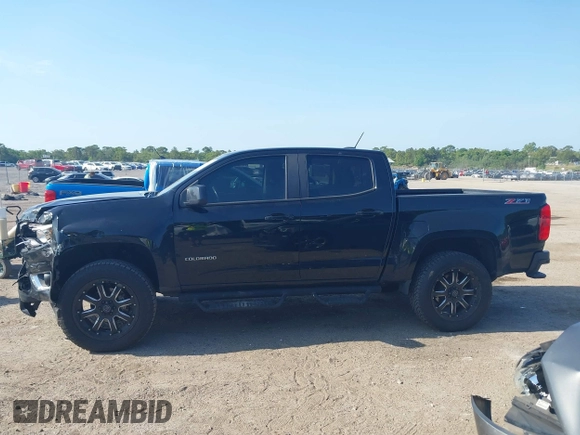 2020 Chevrolet Colorado 2WD Z71 z VIN 1GCGSDEN2L1122555, wystawiony jako IAAI lot #42096724 z przebiegiem 120 679 mil mil oraz . Historia ofert i sprzedaży dostępna na DreamBid. Obrazek 14.
