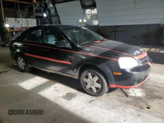 2008 Suzuki Forenza z VIN KL5JD56Z98K859749, wystawiony jako Copart lot #77630514 z przebiegiem 202 609 mil mil oraz Szkody całkowita. Historia ofert i sprzedaży dostępna na DreamBid. Obrazek 4.