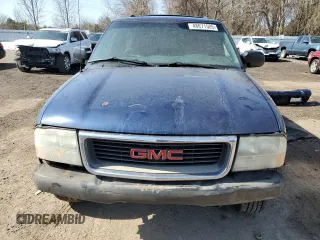 2003 GMC Jimmy z VIN 1GKCT18X43K110056, wystawiony jako Copart lot #48671585 z przebiegiem 272 867 mil mil oraz Czysty tytuł • Clean title. Historia ofert i sprzedaży dostępna na DreamBid. Obrazek 5.