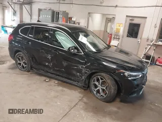 2016 BMW X1 xDrive28i with VIN WBXHT3C34GP884207, listed as a IAAI auction lot 41686036 with 122,406 mi miles. Bid and sale history available at carsss.com. Image 1.