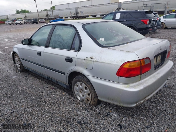 1999 Honda Civic DX with VIN 1HGEJ6628XL028492, listed as a IAAI auction lot 42071358 with 285,769 mi miles. Bid and sale history available at carsss.com. Image 3.
