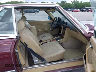 1985 Mercedes-Benz 380 z VIN WDBBA45C0FA026342, wystawiony jako IAAI lot #42197536 z przebiegiem 116 373 mil mil oraz . Historia ofert i sprzedaży dostępna na DreamBid. Obrazek 5.