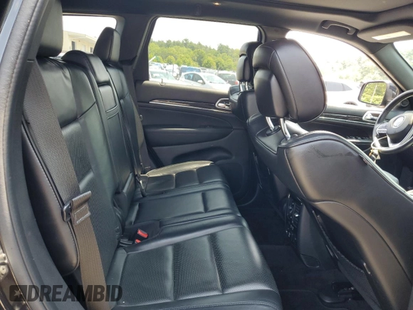 2016 Jeep Grand Cherokee Overland z VIN 1C4RJFCG5GC343864, wystawiony jako Copart lot #60892615 z przebiegiem 97 133 mil mil oraz Szkoda całkowita • Salvage title. Historia ofert i sprzedaży dostępna na DreamBid. Obrazek 11.