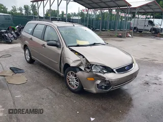 2005 Ford Focus SE with VIN 1FAFP36N95W115720, listed as a IAAI auction lot 42687367 with 77,693 mi miles and . Bid and sale history available at DreamBid. Image 1.
