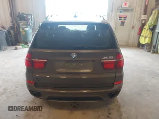 2013 BMW X5 xDrive35i z VIN 5UXZV4C54D0B21144, wystawiony jako IAAI lot #42304165 z przebiegiem 164 673 mil mil oraz . Historia ofert i sprzedaży dostępna na DreamBid. Obrazek 16.