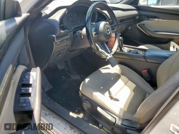 2019 Mazda 3 z VIN JM1BPAJM3K1131108, wystawiony jako Copart lot #57911165 z przebiegiem 65 641 mil mil oraz Szkoda całkowita • Salvage title. Historia ofert i sprzedaży dostępna na DreamBid. Obrazek 8.