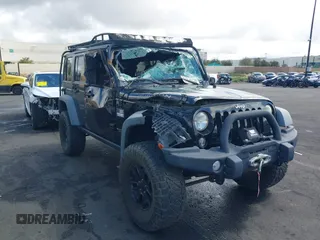 2014 Jeep Wrangler Unlimited Rubicon with VIN 1C4BJWFGXEL172622, listed as a IAAI auction lot 41782796 with 67,594 mi miles. Bid and sale history available at carsss.com. Image 6.