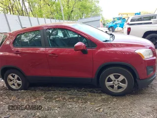 2015 Chevrolet Trax LS z VIN KL7CJPSB0FB198204, wystawiony jako IAAI lot #42237830 z przebiegiem 137 569 mil mil oraz . Historia ofert i sprzedaży dostępna na DreamBid. Obrazek 13.