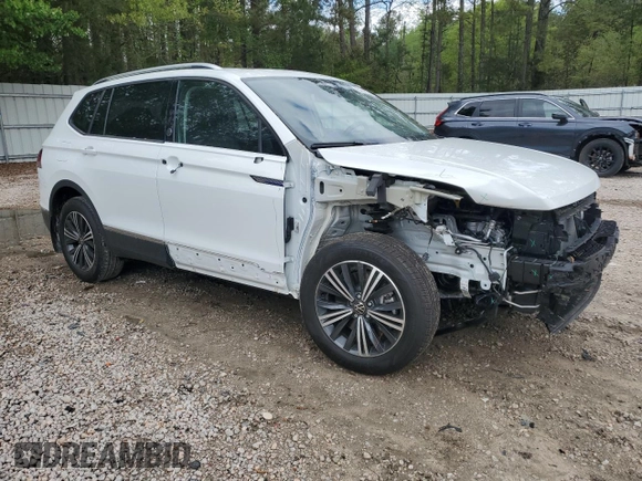 2024 Volkswagen Tiguan with VIN 3VVTB7AX3RM233619, listed as a Copart auction lot 51043355 with 1,002 mi miles and Salvage title. Bid and sale history available at DreamBid. Image 4.