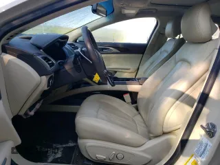2015 Lincoln MKZ z VIN 3LN6L2JK4FR629312, wystawiony jako Copart lot #60230405 z przebiegiem 79 570 mil mil oraz Szkoda całkowita • Salvage title. Historia ofert i sprzedaży dostępna na DreamBid. Obrazek 7.