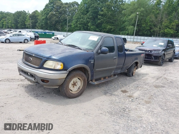 2003 Ford F-150 XL with VIN 1FTRX18W63NA57957, listed as a IAAI auction lot 42514779 with 406,771 mi miles and . Bid and sale history available at DreamBid. Image 2.