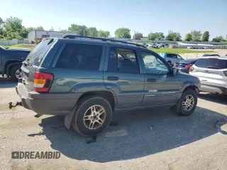 2002 Jeep Grand Cherokee Laredo with VIN 1J4GW48S02C174656, listed as a Copart auction lot 56954155 with 235,427 mi miles and Salvage title. Bid and sale history available at DreamBid. Image 3.