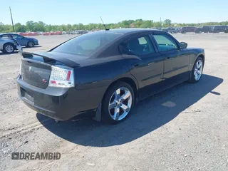2008 Dodge Charger R/T with VIN 2B3LA53H18H257735, listed as a IAAI auction lot 42136677 with 224,754 mi miles and . Bid and sale history available at carsss.com. Image 4.