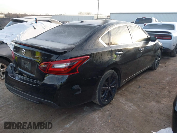 2018 Nissan Altima SV with VIN 1N4AL3AP9JC233020, listed as a IAAI auction lot 41142328 with 133,786 mi miles and . Bid and sale history available at carsss.com. Image 4.