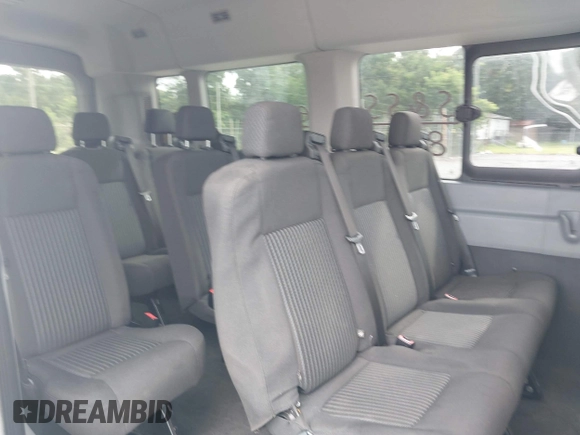 2015 Ford Transit Passenger XL with VIN 1FBAX2CG8FKA22611, listed as a IAAI auction lot 42495659 with 275,024 mi miles and . Bid and sale history available at DreamBid. Image 8.
