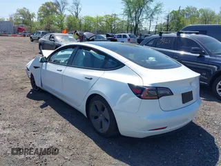 2023 Tesla Model 3 z VIN 5YJ3E1EA5PF553275, wystawiony jako IAAI lot #42132154 z przebiegiem Nie podano mil oraz . Historia ofert i sprzedaży dostępna na DreamBid. Obrazek 3.