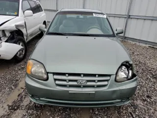 2003 Hyundai Accent GL with VIN KMHCG35C23U264701, listed as a Copart auction lot 80029154 with 142,090 mi miles and Salvage Title. Bid and sale history available at carsss.com. Image 5.