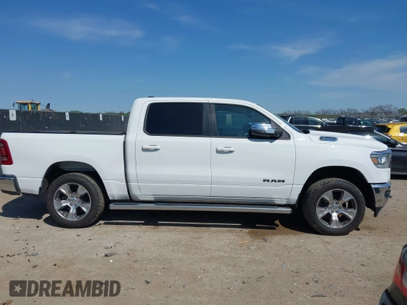 2023 Ram 1500 Laramie with VIN 1C6SRFJT0PN508550, listed as a IAAI auction lot 41913849 with 57,765 mi miles and . Bid and sale history available at DreamBid. Image 13.