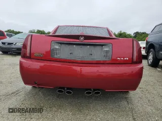 2005 Cadillac XLR z VIN 1G6YV34AX55600837, wystawiony jako Copart lot #75055604 z przebiegiem Nie podano mil oraz Szkody całkowita. Historia ofert i sprzedaży dostępna na DreamBid. Obrazek 6.