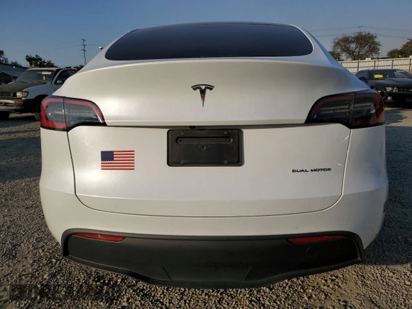 2023 Tesla Model Y Long Range with VIN 7SAYGDEE9PA129876, listed as a Copart auction lot 41819605 with 36,110 mi miles and Salvage Title. Bid and sale history available at DreamBid. Image 6.