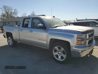 2015 Chevrolet Silverado 1500 LS with VIN 1GCRCPEH1FZ335827, listed as a Copart auction lot 50414585 with 214,079 mi miles and Salvage Title. Bid and sale history available at DreamBid. Image 4.