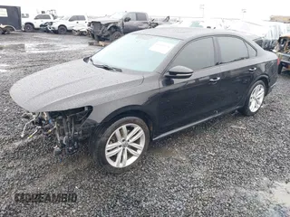 2019 Volkswagen Passat 2.0T Wolfsburg Edition with VIN 1VWLA7A39KC011539, listed as a IAAI auction lot 41616136 with 54,652 mi miles. Bid and sale history available at carsss.com. Image 2.