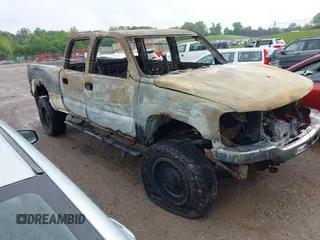 2006 GMC Sierra 2500HD SL with VIN 1GTHK23DX6F213972, listed as a IAAI auction lot 42063903 with Not provided miles and . Bid and sale history available at DreamBid. Image 1.