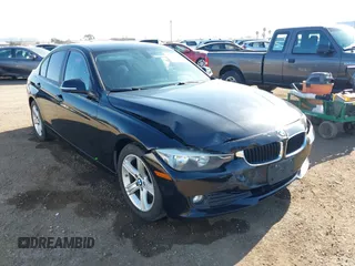 2013 BMW 3 Series 320i with VIN WBA3B1C57DF461779, listed as a IAAI auction lot 41991156 with 134,592 mi miles. Bid and sale history available at carsss.com. Image 6.