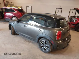 2011 MINI Countryman S z VIN WMWZC3C54BWL78942, wystawiony jako IAAI lot #42345296 z przebiegiem 158 202 mil mil oraz . Historia ofert i sprzedaży dostępna na DreamBid. Obrazek 3.
