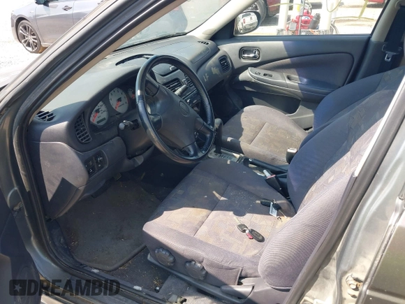 2001 Nissan Sentra SE z VIN 3N1BB51D61L127666, wystawiony jako IAAI lot #42400126 z przebiegiem 190 345 mil mil oraz . Historia ofert i sprzedaży dostępna na DreamBid. Obrazek 5.
