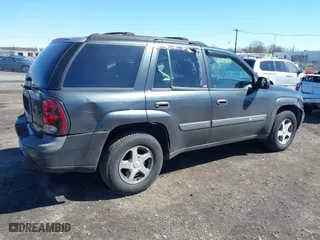 2004 Chevrolet TrailBlazer LS with VIN 1GNDT13S142391821, listed as a IAAI auction lot 41860650 with 184,915 mi miles. Bid and sale history available at carsss.com. Image 4.
