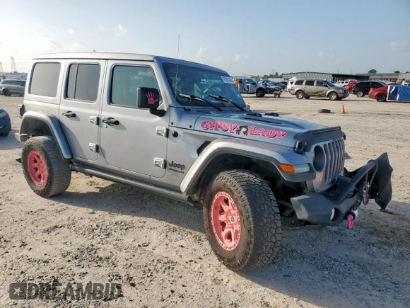 2021 Jeep Wrangler Unlimited Rubicon with VIN 1C4HJXFG0MW616829, listed as a Copart auction lot 61041425 with 128,724 mi miles and Salvage title. Bid and sale history available at DreamBid. Image 4.