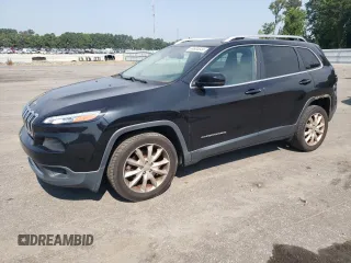 2016 Jeep Cherokee Limited with VIN 1C4PJLDB0GW136788, listed as a Copart auction lot 69684644 with 126,039 mi miles and Salvage title. Bid and sale history available at DreamBid. Image 1.