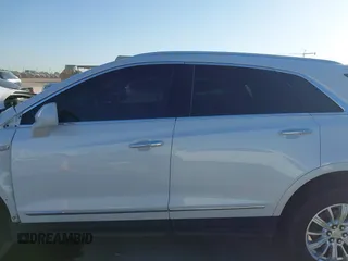 2018 Cadillac XT5 Luxury FWD z VIN 1GYKNCRS3JZ143354, wystawiony jako IAAI lot #41973536 z przebiegiem 101 327 mil mil oraz . Historia ofert i sprzedaży dostępna na DreamBid. Obrazek 14.