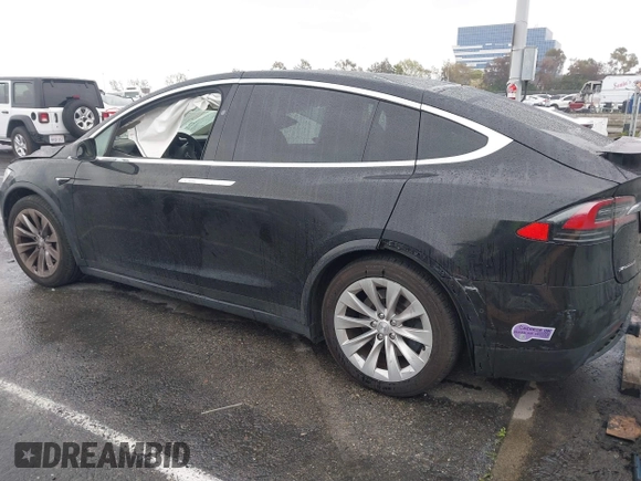 2018 Tesla Model X 75D with VIN 5YJXCBE25JF117801, listed as a IAAI auction lot 41798116 with 95,253 mi miles. Bid and sale history available at carsss.com. Image 3.