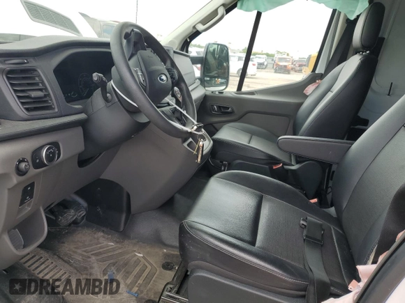 2023 Ford Transit Cargo with VIN 1FTBR1C83PKA24362, listed as a Copart auction lot 58766595 with 7,047 mi miles and Salvage title. Bid and sale history available at DreamBid. Image 7.