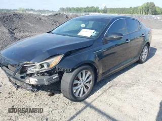 2014 Kia Optima EX with VIN 5XXGN4A70EG277871, listed as a IAAI auction lot 42183248 with 128,300 mi miles and . Bid and sale history available at carsss.com. Image 2.