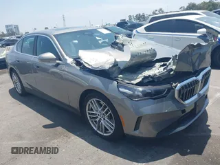 2024 BMW 5 Series 530i xDrive with VIN WBA53FJ06RCS35848, listed as a IAAI auction lot 42500565 with 23,188 mi miles and . Bid and sale history available at DreamBid. Image 1.