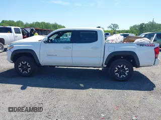 2016 Toyota Tacoma SR with VIN 3TMCZ5AN0GM003224, listed as a IAAI auction lot 42289910 with 140,899 mi miles and . Bid and sale history available at DreamBid. Image 14.
