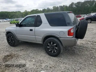 2002 Isuzu Rodeo z VIN 4S2CK57W324328043, wystawiony jako Copart lot #54584025 z przebiegiem 141 523 mil mil oraz Szkody całkowita. Historia ofert i sprzedaży dostępna na DreamBid. Obrazek 2.