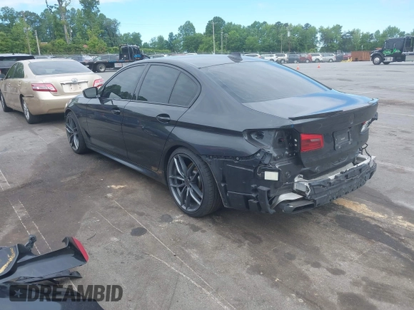 2018 BMW 5 Series M550i xDrive with VIN WBAJB9C56JB035364, listed as a IAAI auction lot 42179145 with 112,123 mi miles and . Bid and sale history available at DreamBid. Image 3.
