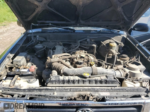 1994 Toyota Pickup DX z VIN JT4RN01P8R7065882, wystawiony jako Copart lot #56998705 z przebiegiem 86 406 mil mil oraz Czysty tytuł • Clean title. Historia ofert i sprzedaży dostępna na DreamBid. Obrazek 11.