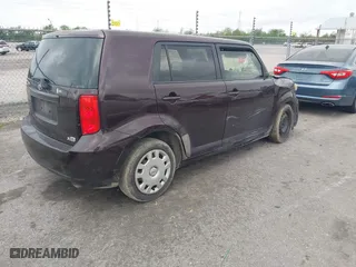 2010 Scion xB with VIN JTLZE4FE2A1117808, listed as a IAAI auction lot 41910113 with 242,060 mi miles. Bid and sale history available at carsss.com. Image 4.