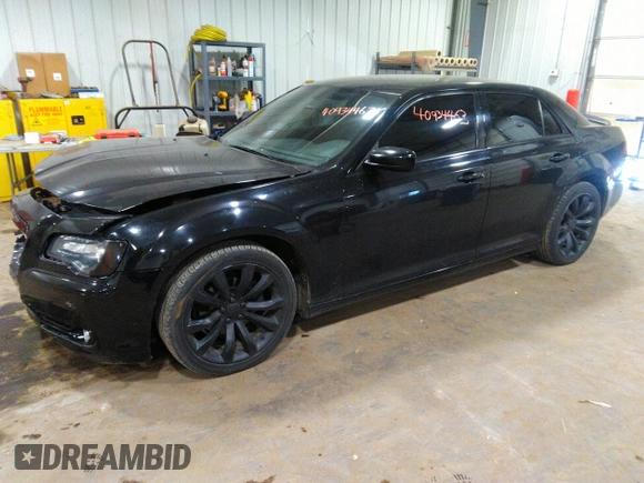 2014 Chrysler 300 S with VIN 2C3CCABG2EH343503, listed as a IAAI auction lot 40934463 with 128,876 mi miles and . Bid and sale history available at carsss.com. Image 2.