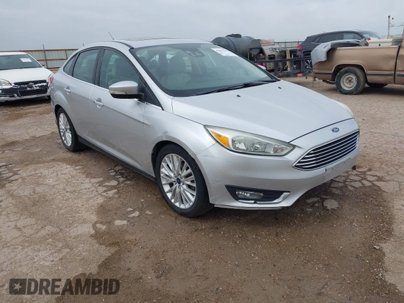 2017 Ford Focus Titanium with VIN 1FADP3J24HL229702, listed as a IAAI auction lot 42057013 with 120,250 mi miles and . Bid and sale history available at DreamBid. Image 1.