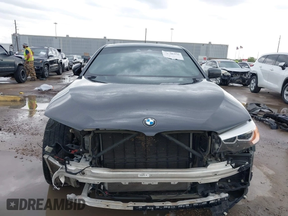 2020 BMW 5 Series 530i with VIN WBAJR3C08LWW77822, listed as a IAAI auction lot 41880376 with 52,533 mi miles and . Bid and sale history available at carsss.com. Image 6.