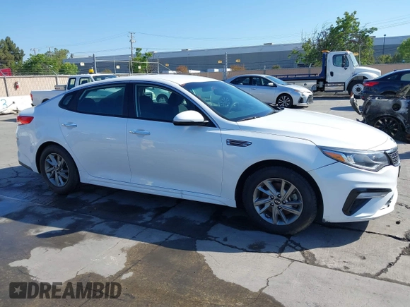 2019 Kia Optima LX with VIN 5XXGT4L33KG324175, listed as a IAAI auction lot 42139795 with 105,273 mi miles. Bid and sale history available at carsss.com. Image 1.
