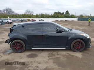 2013 Hyundai Veloster Turbo z VIN KMHTC6AE5DU151346, wystawiony jako IAAI lot #41177509 z przebiegiem 112 955 mil mil oraz . Historia ofert i sprzedaży dostępna na DreamBid. Obrazek 14.