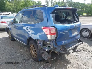 2017 Subaru Forester Touring with VIN JF2SJGWC2HH467144, listed as a IAAI auction lot 42319496 with 122,845 mi miles and . Bid and sale history available at DreamBid. Image 3.